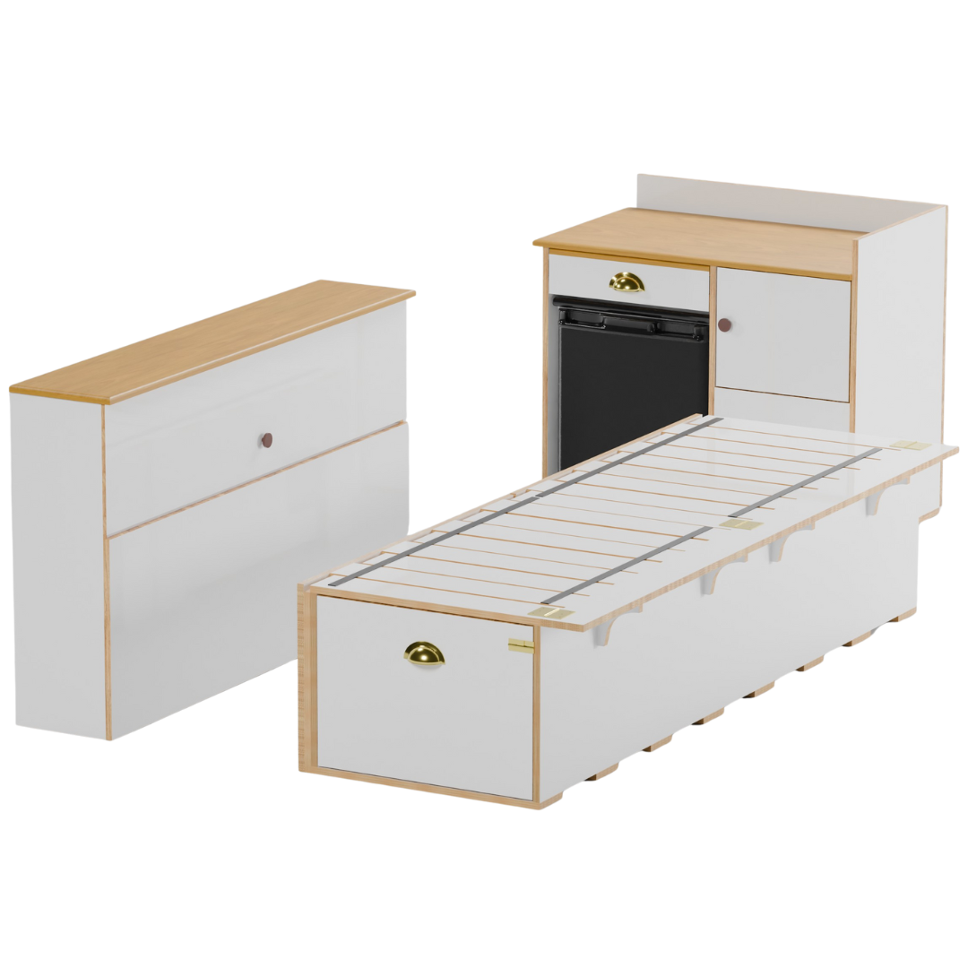 Modern melamine plywood campervan interior featuring a side-sliding bed frame, medium side storage unit, and a front cabinetry unit with a dedicated cutout for a fridge