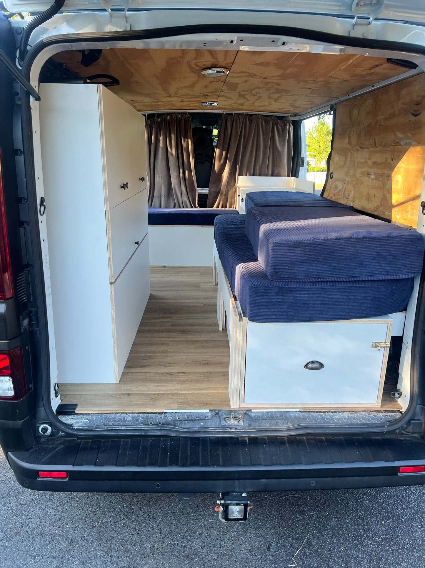 Sample of High Side Storage and sliding bed frame with mattress placed in a renault trafic campervan