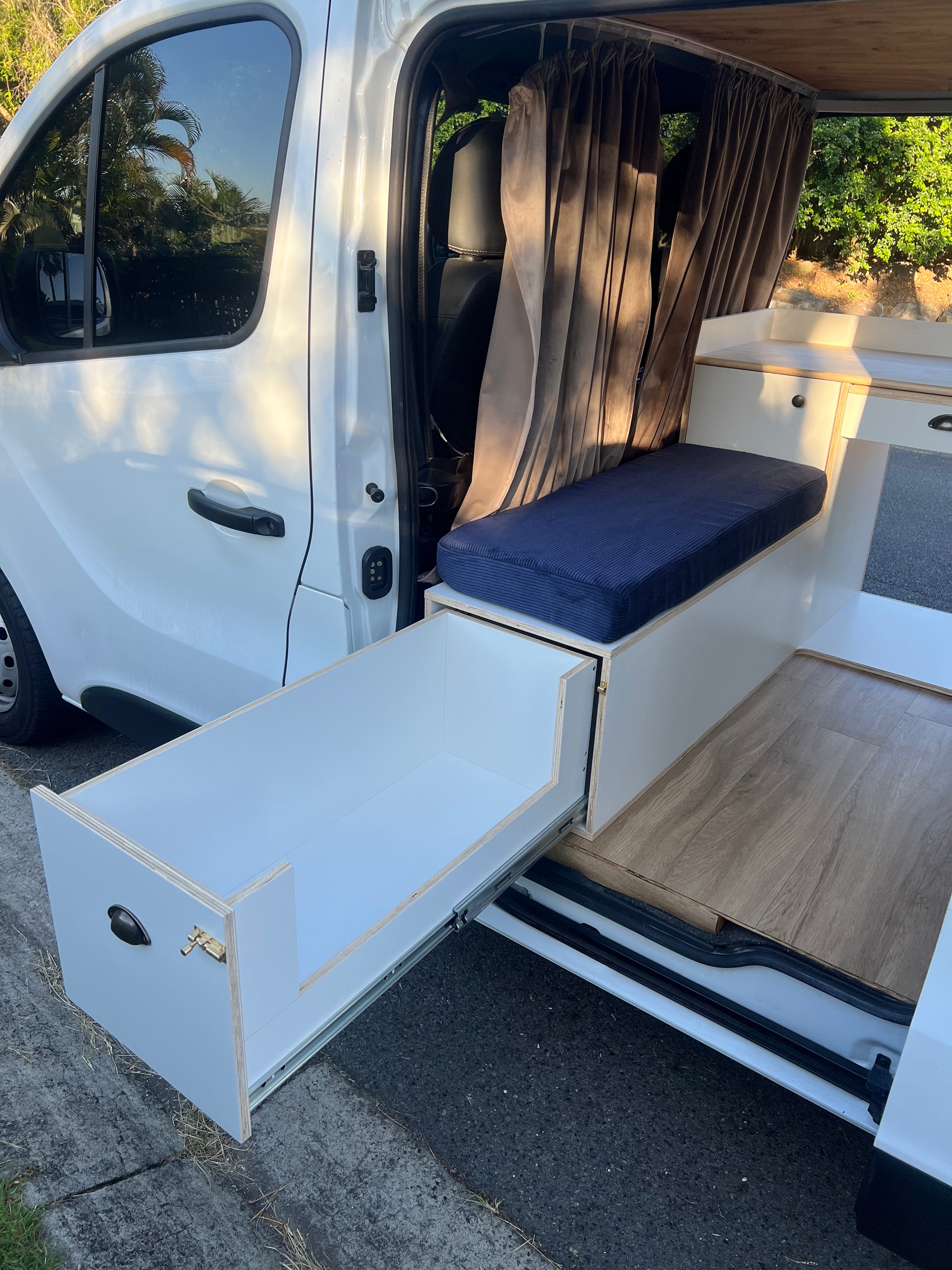 Sample of front unit with sliding out kitchen in a Renault Trafic campervan
